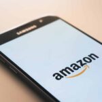 black Samsung Galaxy smartphone displaying Amazon logo
